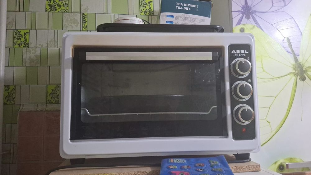 Духовка почти новый