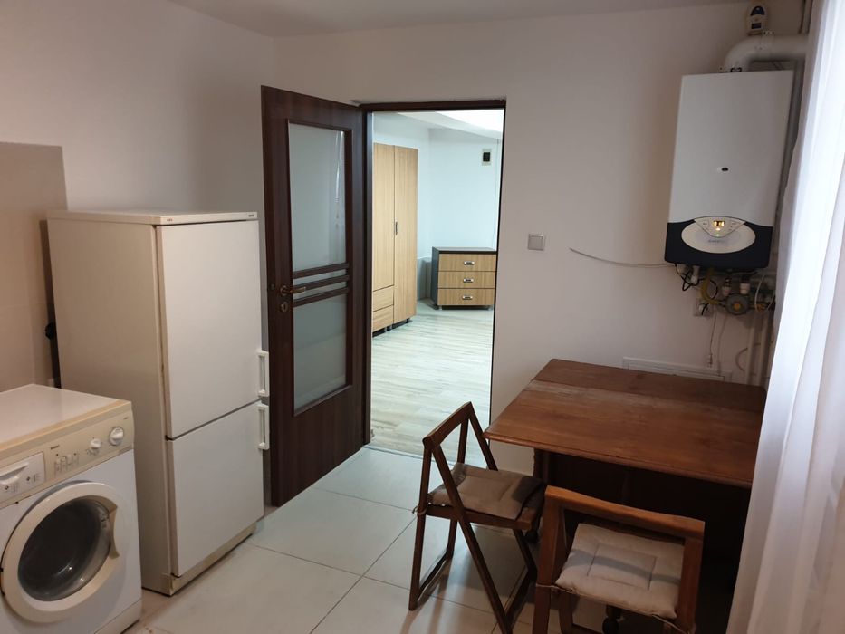 Garsoniera la casa cu curte