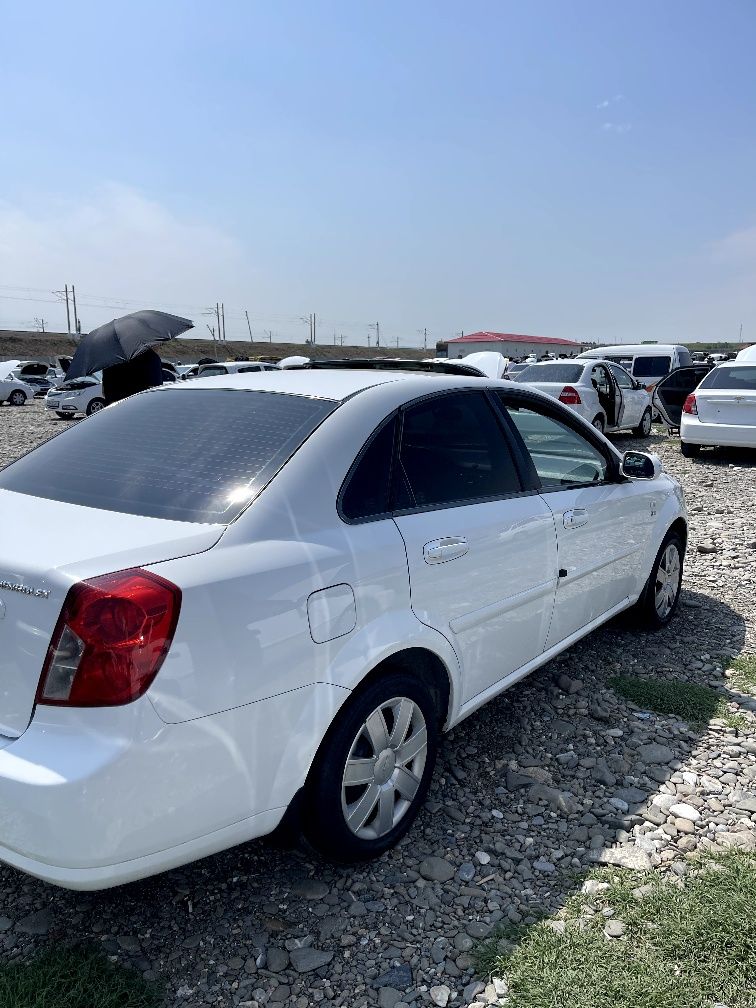 Lacetti 1.6L yili 2013 avtamat 3poz