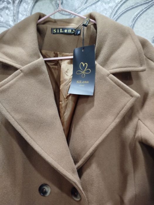 Женское польто……..