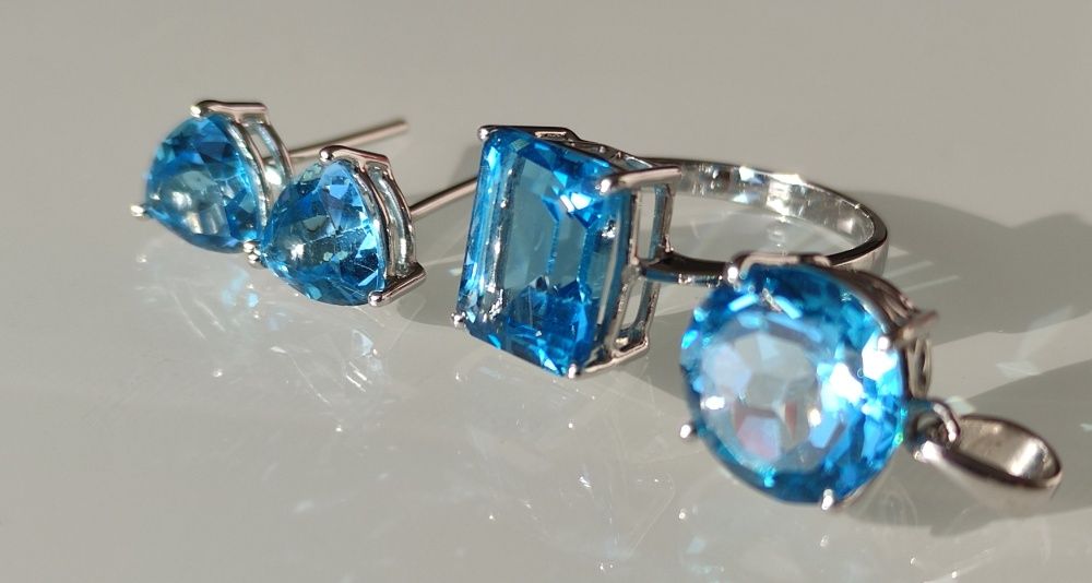 Set aur 18k cu topaz