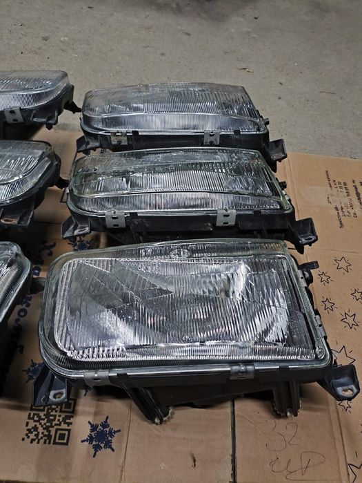 Фара Hella Passat B3