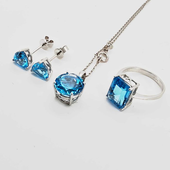 Set aur 18k cu topaz