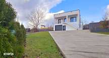 Vila 4 camere, Garaj, 2 bai, SU 210mp, teren 1000mp, CIURBESTI lac