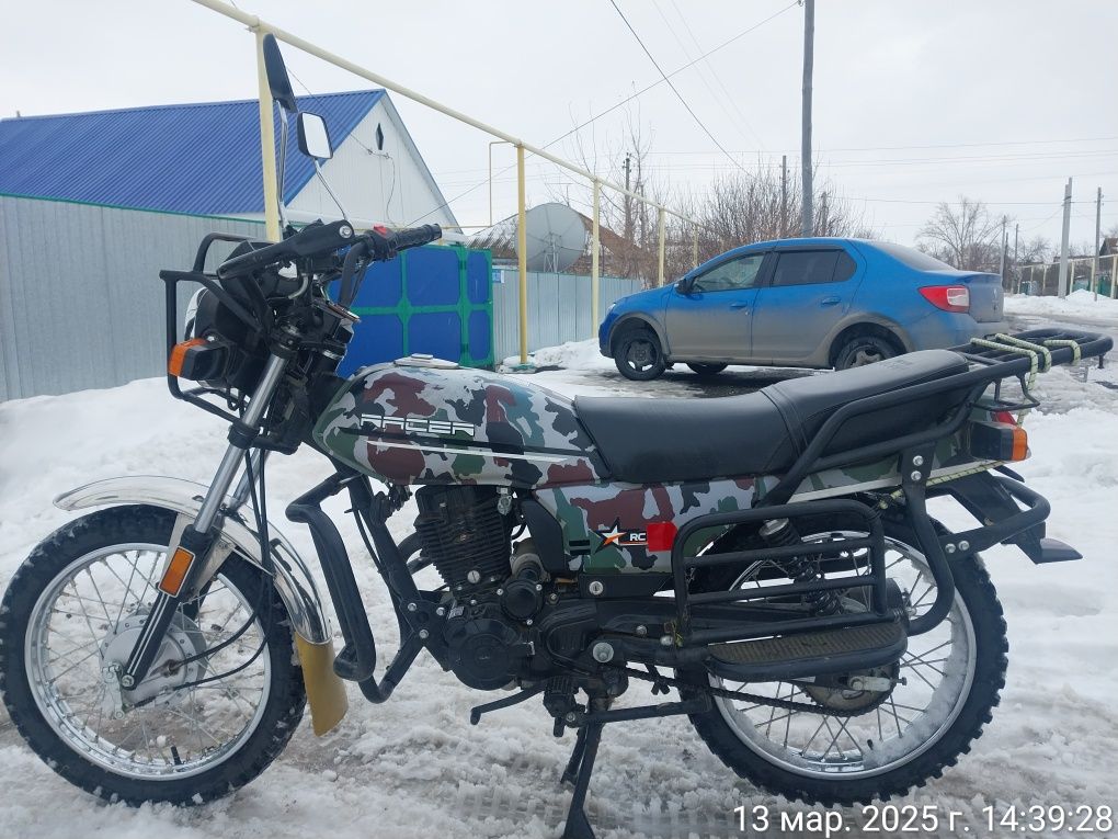 Мотоцикл раисер.