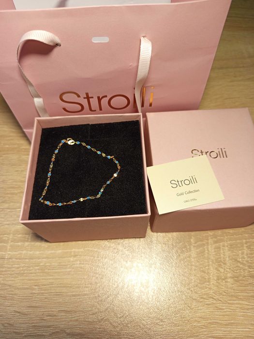 Златна гривна и сребърни обеци