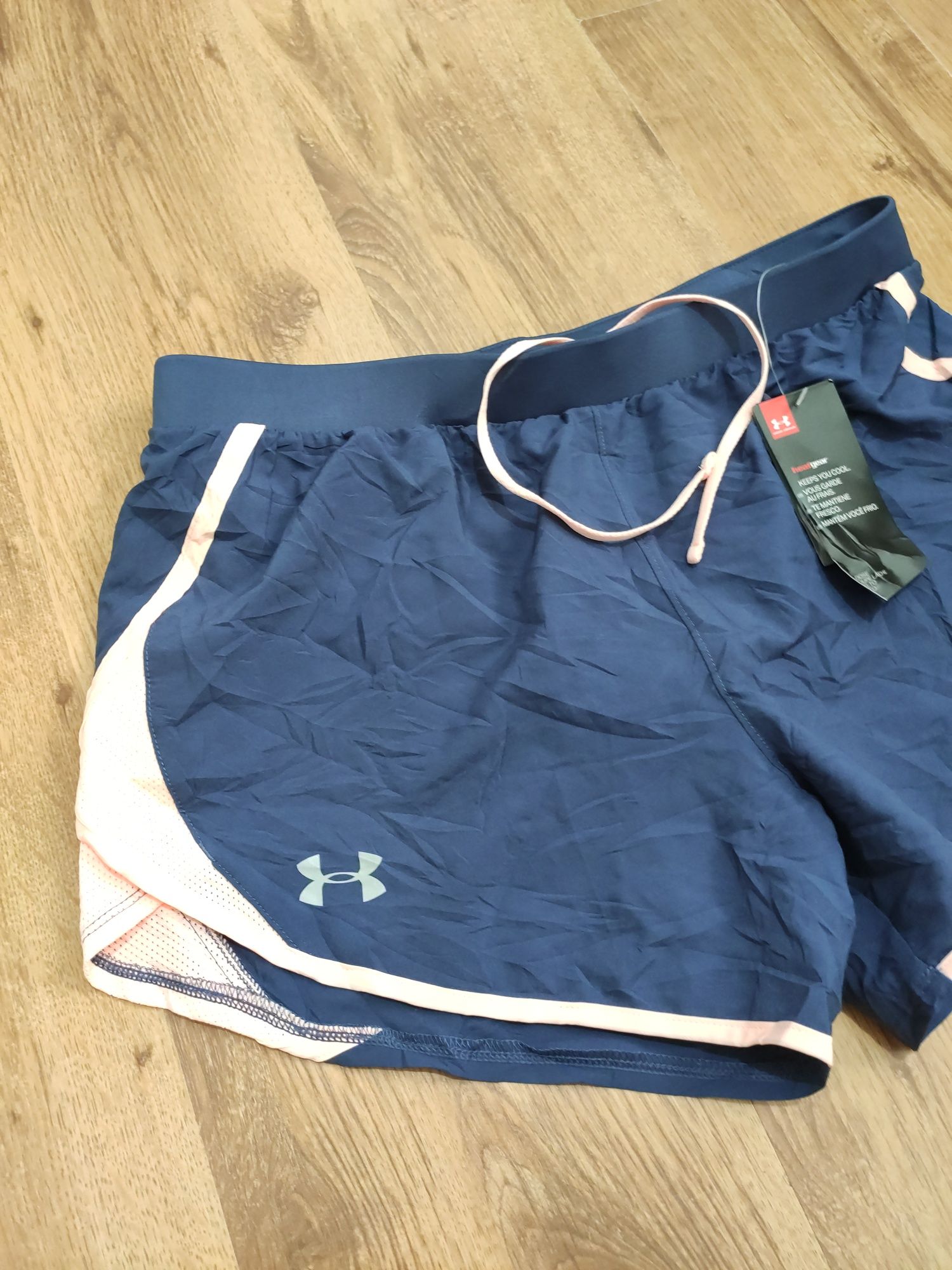 Pantaloni scurți de damă Under Armour mărimea M