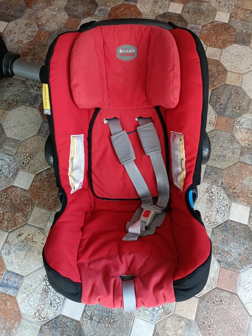 Scoică Britax Romer 0-13 kg cu prindere în centură cu spatele