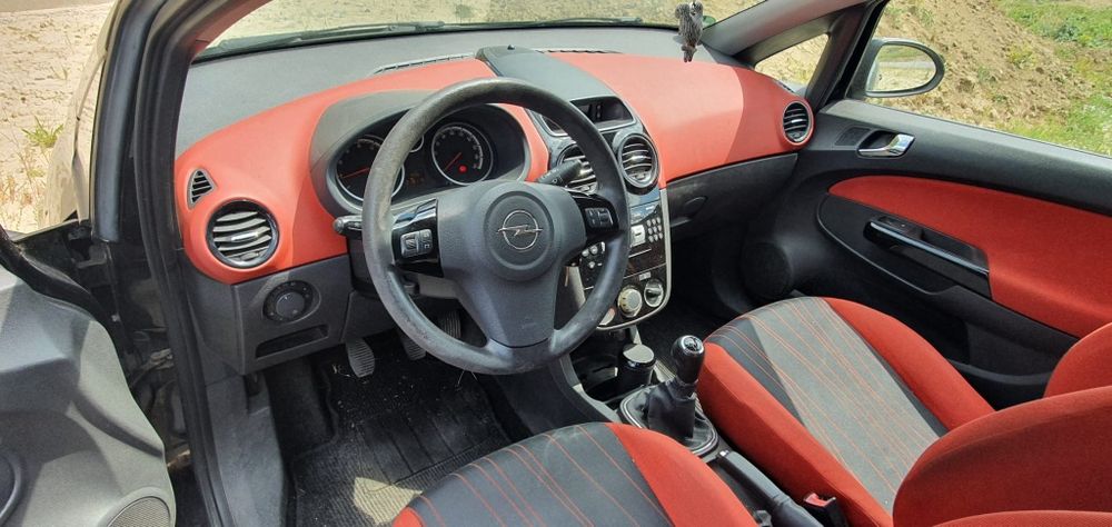 Plansa bord Opel Corsa D rosu cu negru