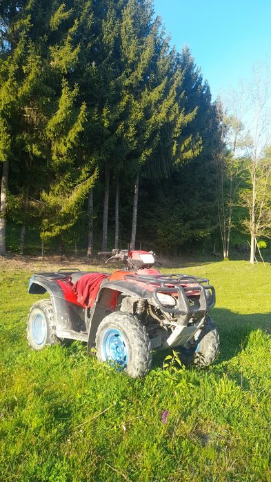 Vând atv honda .