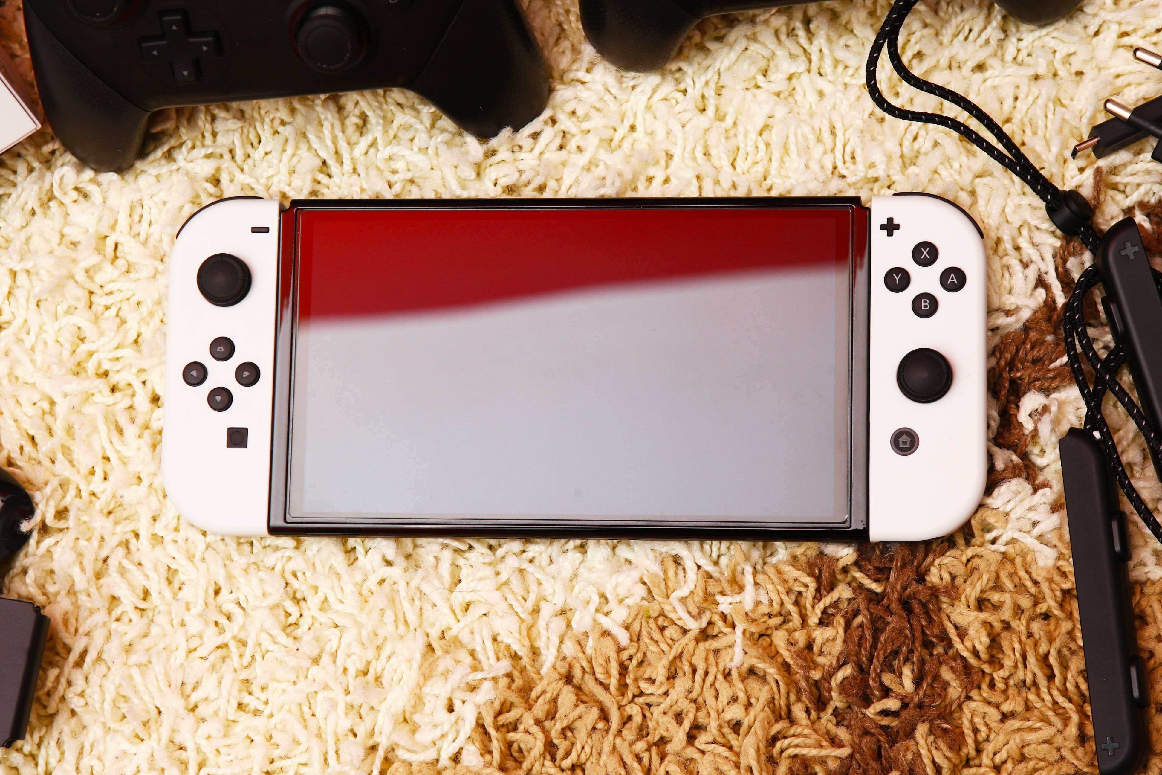 Nintendo Switch OLED modat 400GB jocuri folie sticla husa