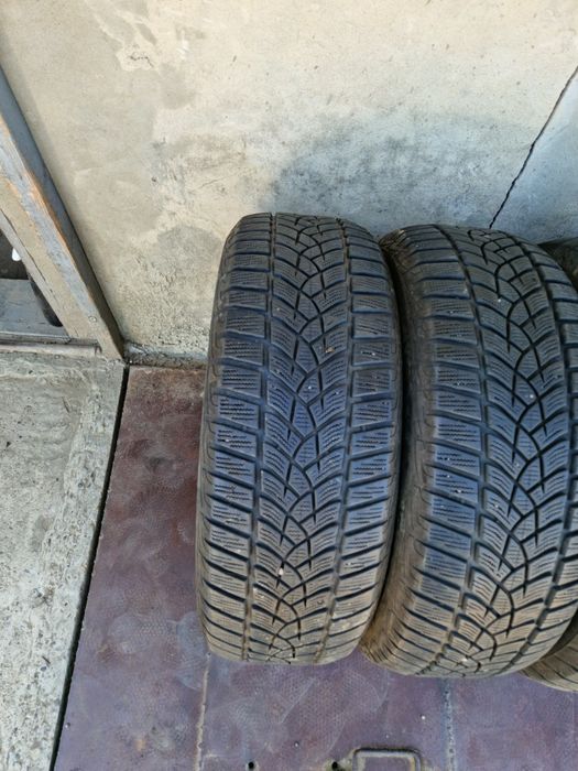 215 65 16  iarna M+S  Goodyear/Powertrac