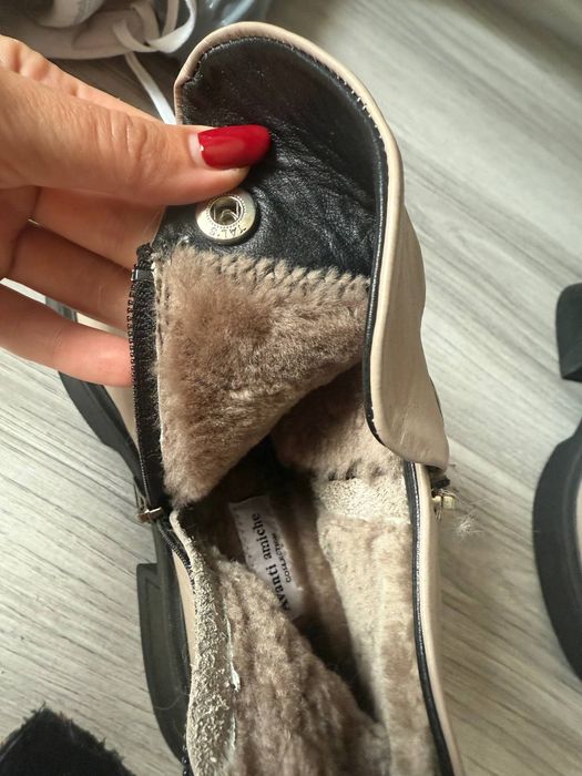 Продам новые кожаные сапоги