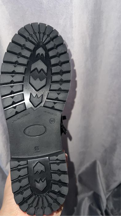 Зимние кожаные на цигейке ботинки