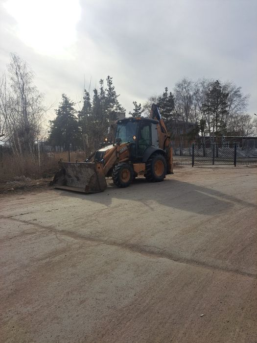 Экскаватор погрузчик 3в1