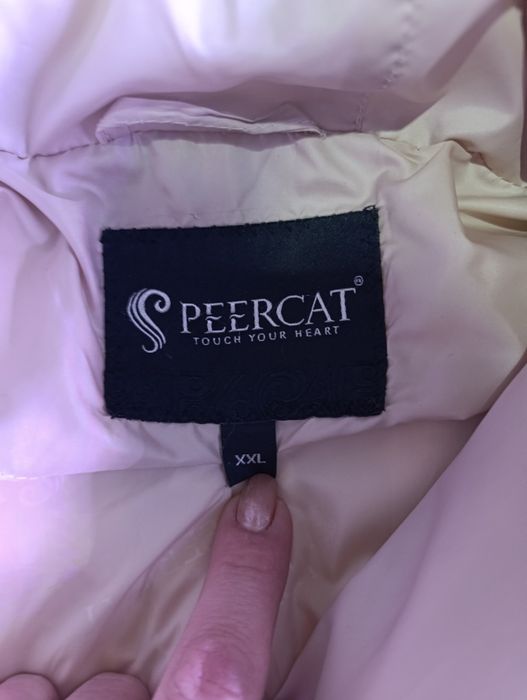 Пуховик до колен.