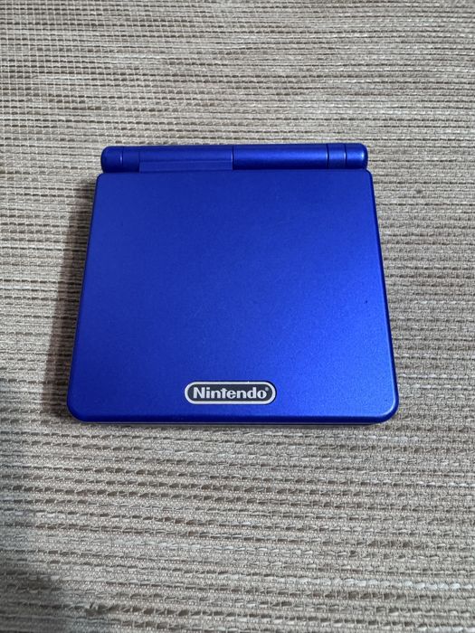 Nintendo GBA SP + Mario Bros 4