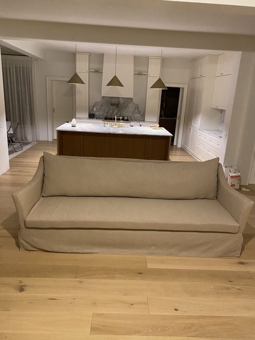 Canapea crem din material tip in noua