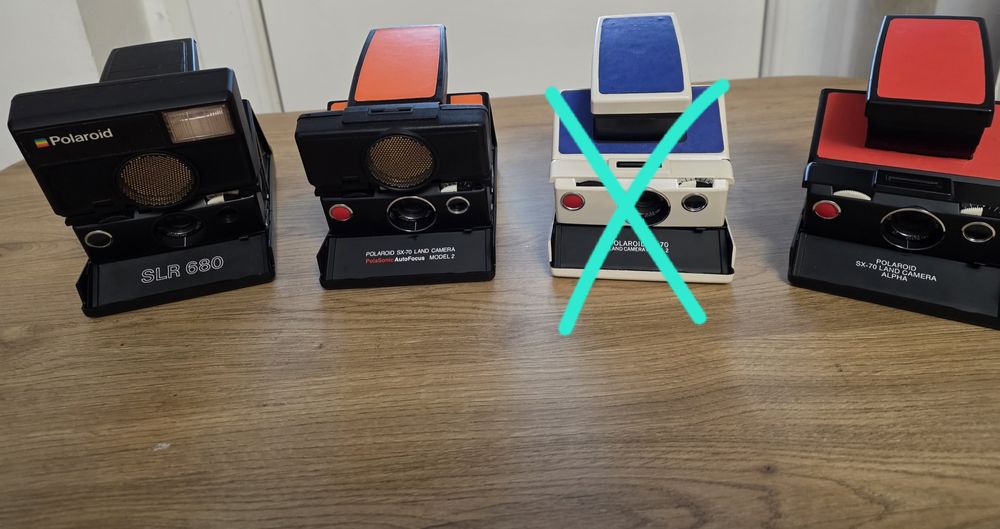 Camere pliabile polaroid SLR680 și SX-70