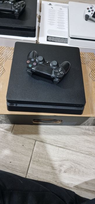 Playstation 4 Slim 500-1tb (4 jocuri fizice-12 digitale)
