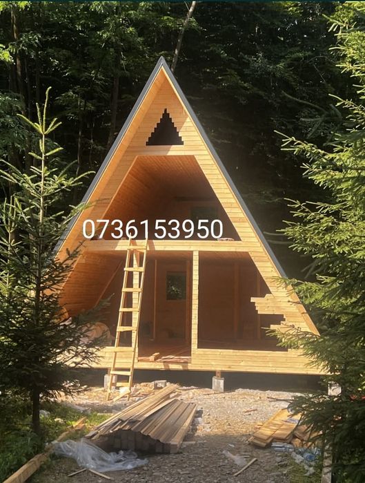 Case din lemn la cheie