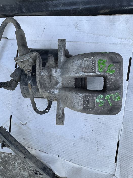Etrier cu motoras electric stanga spate pt vw passat b6
