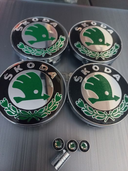 Skoda - skoda/vrs-Set 4 capace  si ventile pentru jante aliaj.