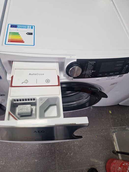 Пералня със сушилня AEG 9 кг AutoDos Wi Fi
