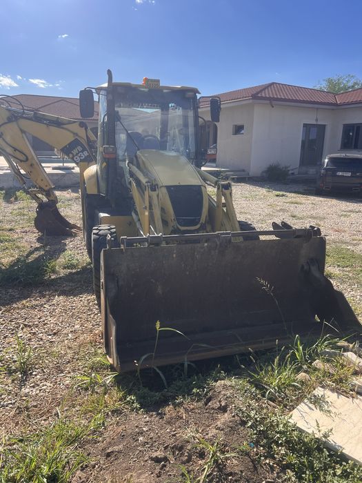 Buldoexcavator Komatsu