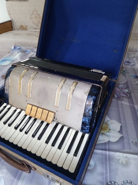 Garmoshka Akardion xolati yaxshi