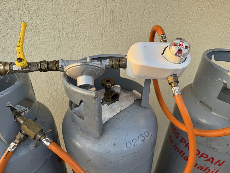 Vând 4buteli cu centralina