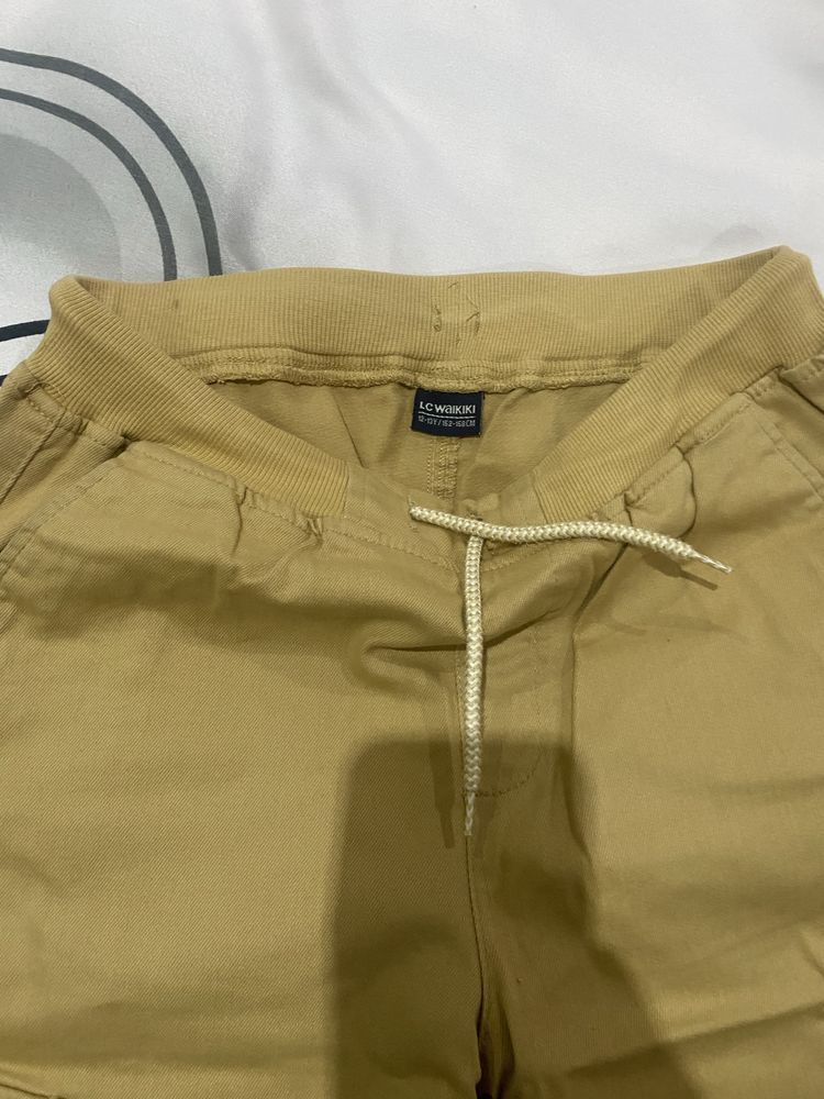 Vand pantaloni cargo