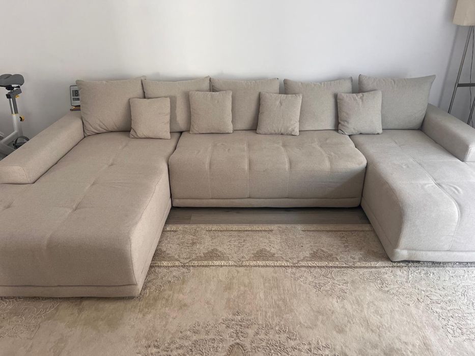 Coltar in forma de U extensibil.