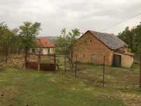 Casă si teren la tara. suprafata 12.500m2 Intravilan