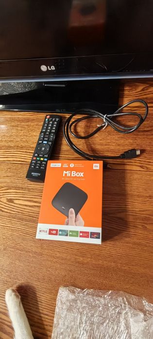 Продам телевизор LG и телевизионную приставку MiBox в отличном состоян