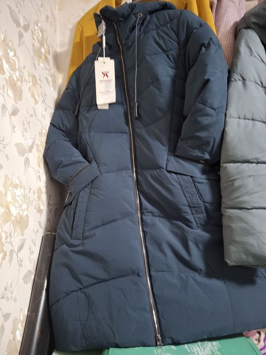 Продам пуховики  новые