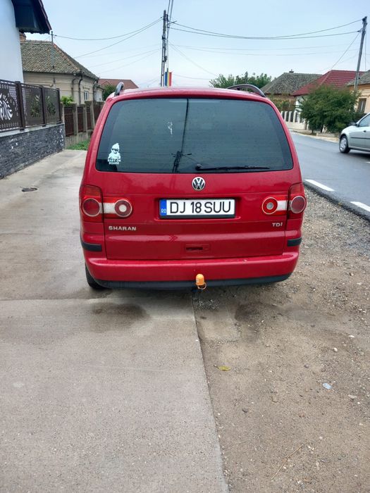VW Sharan 2007 1.9 TDI 85 kW – 7 locuri – Climatronic bi-zonă – Roșu