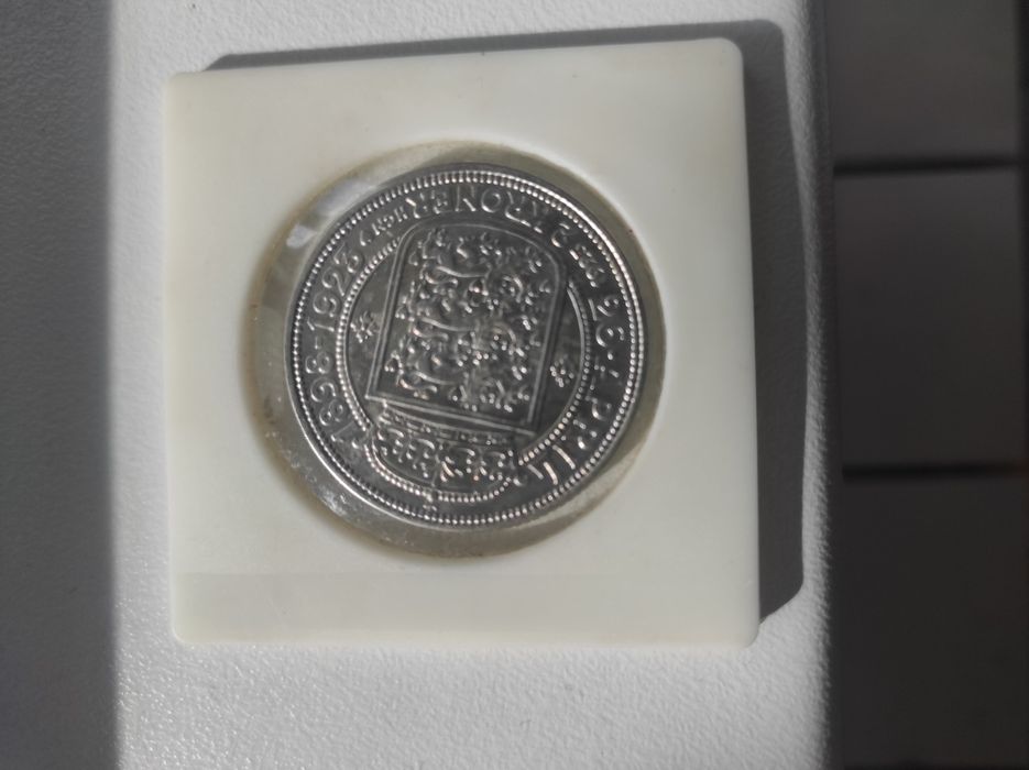 Monedă veche tiplata