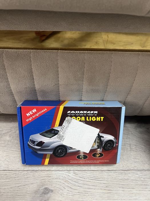 Подсветка в двери авто