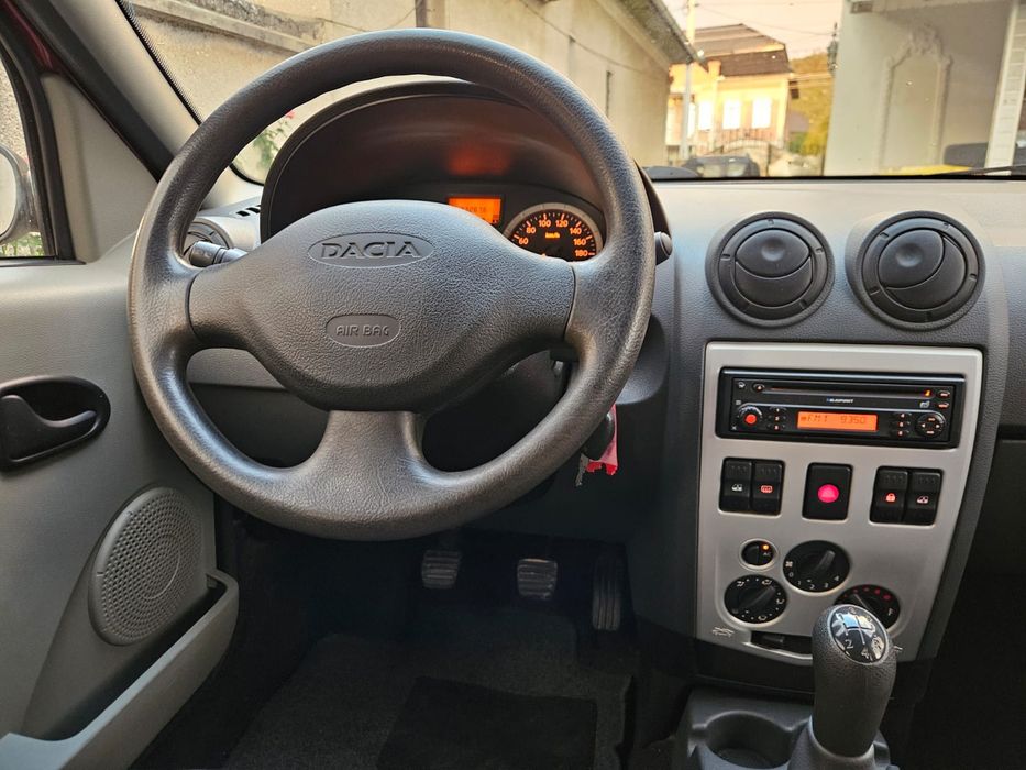 Dacia Logan 2008 limuzina 1.6 mpi special laureate Climă