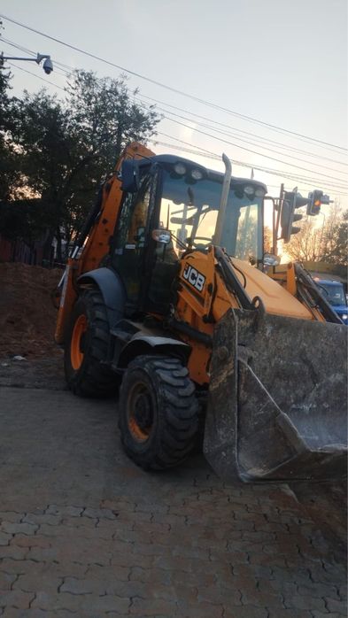 Услуги экскаватора погрузчик