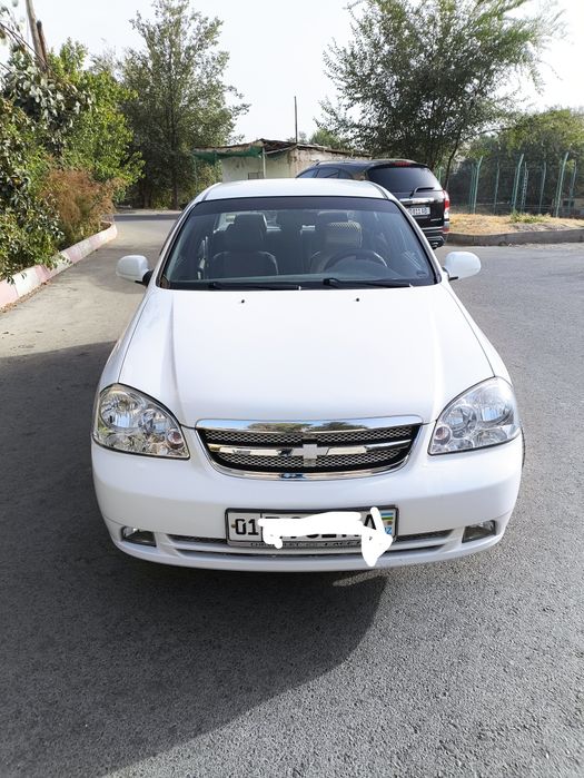 Ласетти 1.8 белый, мкп, 76800км, 2012 г.