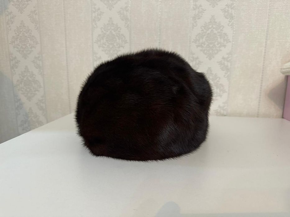 Женская норкавая шапка
