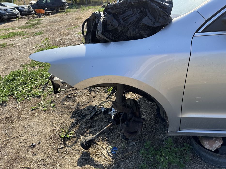 Aripa stanga fata skoda superb 2 facelift 2012-2014