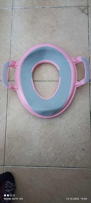 Детское сиденье на унитазе