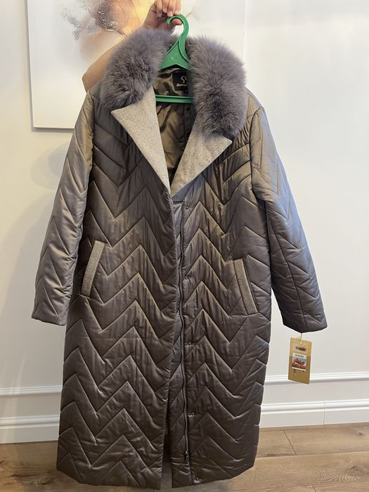 Продам пуховик новый с этикеткой на верблюжке