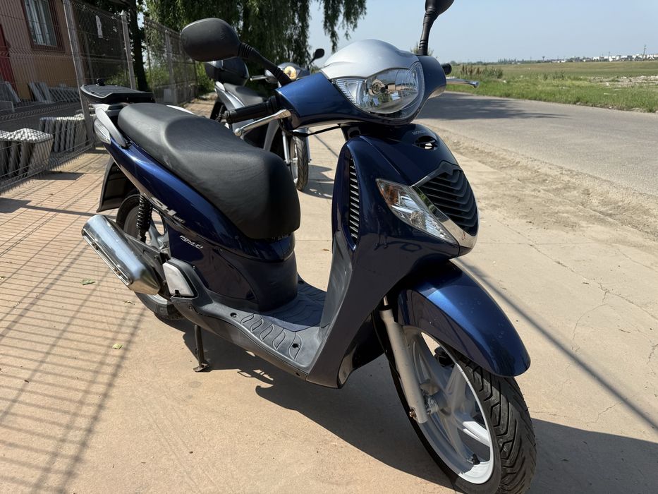 Honda sh 125i se conduce cu categoria B