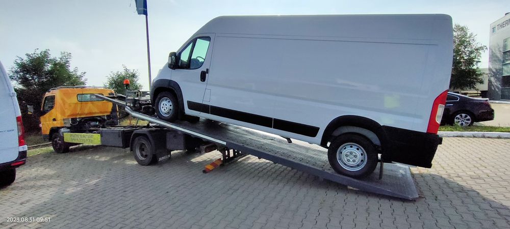 Tractari auto , Asistenta rutiera , Depanare auto ,