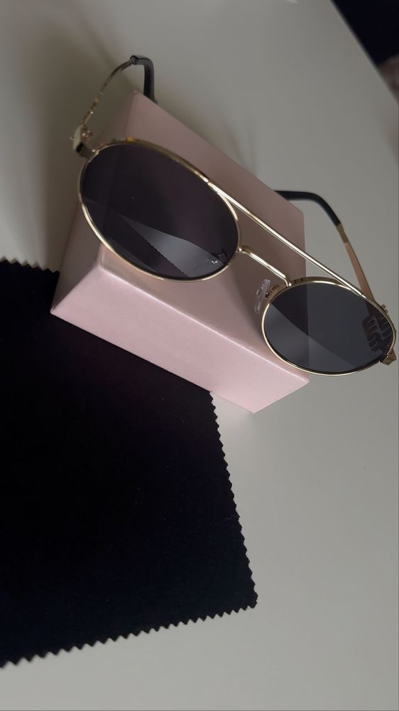 Слънчеви очила от Miu Miu