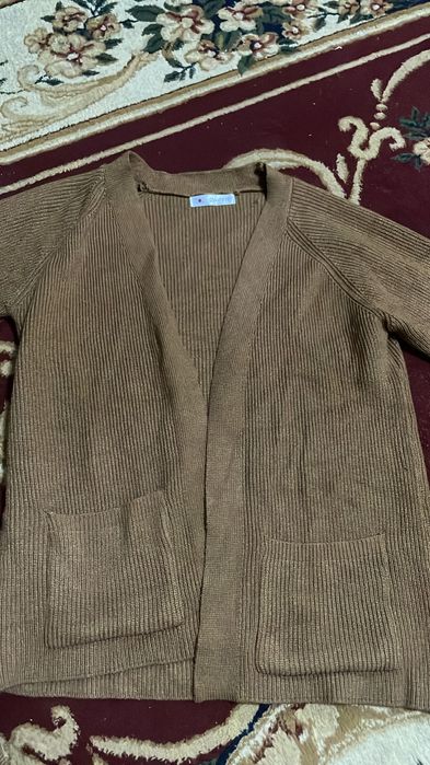 Вязание кардиган коричневого цвета с карманами